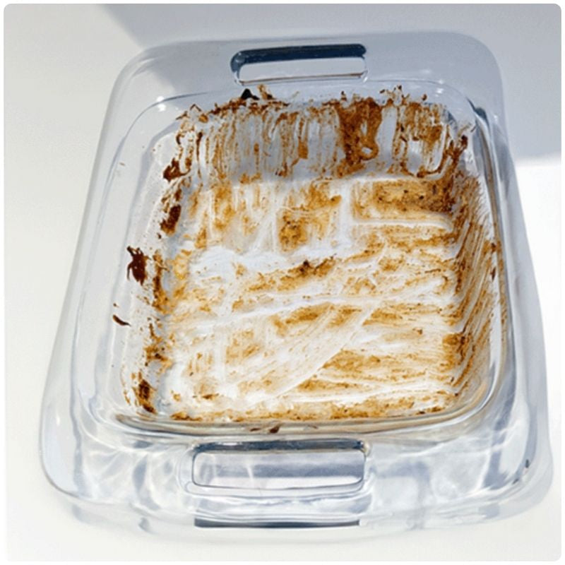 Before cleaning - baked-on residue on dish